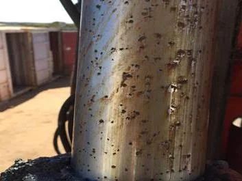 Hard chrome coated cylinder rod after 2 months, pitted with rust