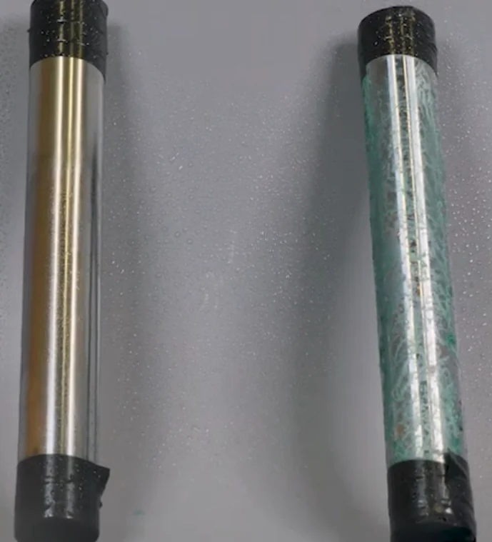 The same two rods after 72 hours in mine water: the TripleHard® rod on the left is unchanged, the hard chrome rod on the right is covered in green corrosion
